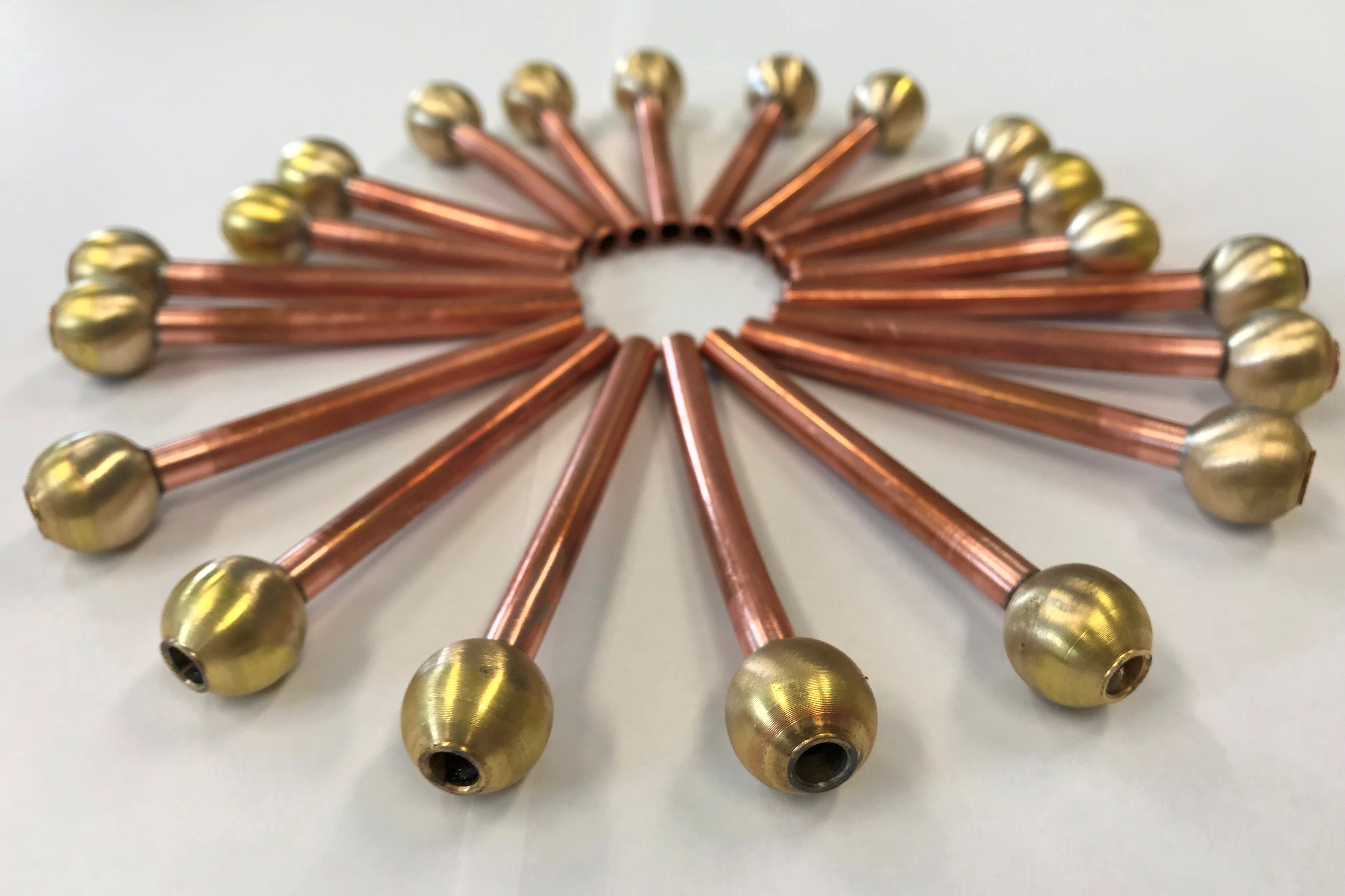 Copper tube joint with brass ball.